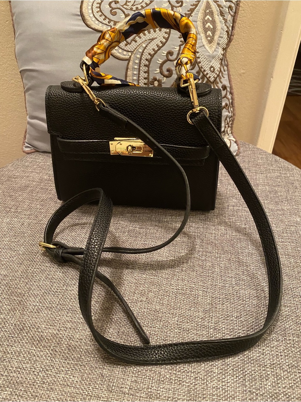 Black Pebbled Satchel with Gold Hardware and Patterned Handle Scarf